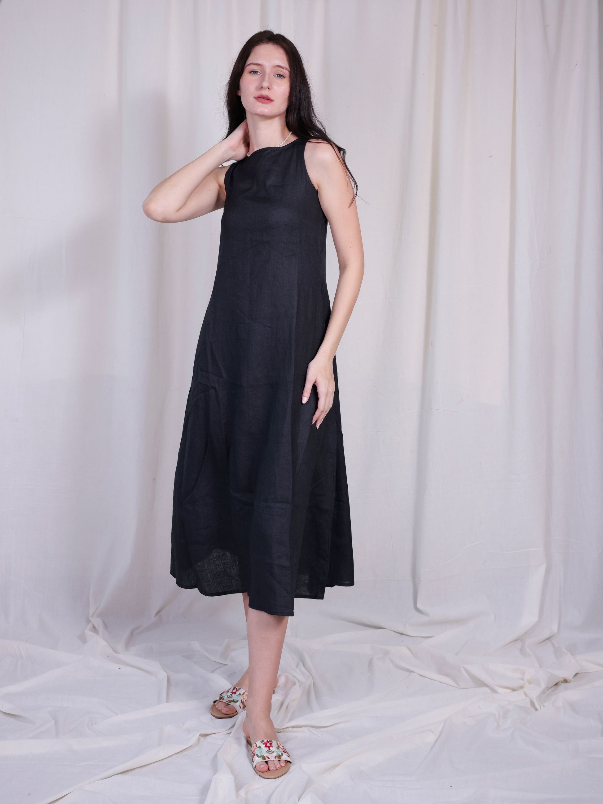 sleeveless black linen midi dress